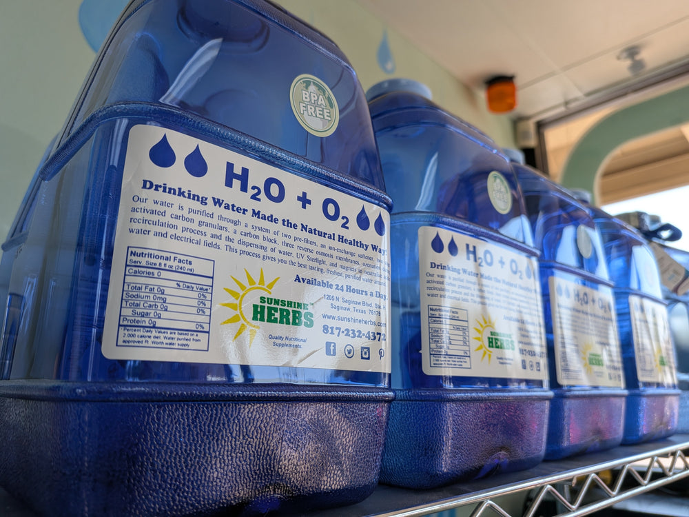 Sunshine Herbs water jugs on the shelf